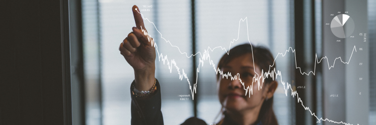 Woman looking at financial chart Woman looking at financial chart