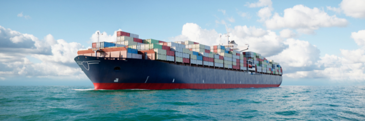 Supply_Chain_750x250_Header Cargo ship with crates on the ocean